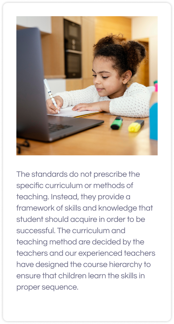 A girl solving math with laptop and text for 2nd grade common core math curriculum below