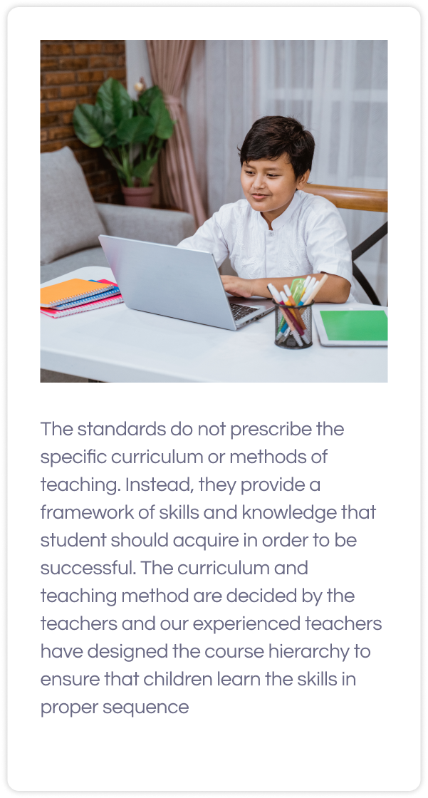 A boy in white shirt looking at a laptop and text for grade 6 common core math curriculum below